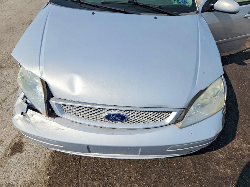 Photo 11 from auction – 2005 FORD FOCUS with VIN 1FAFP38Z15W153765