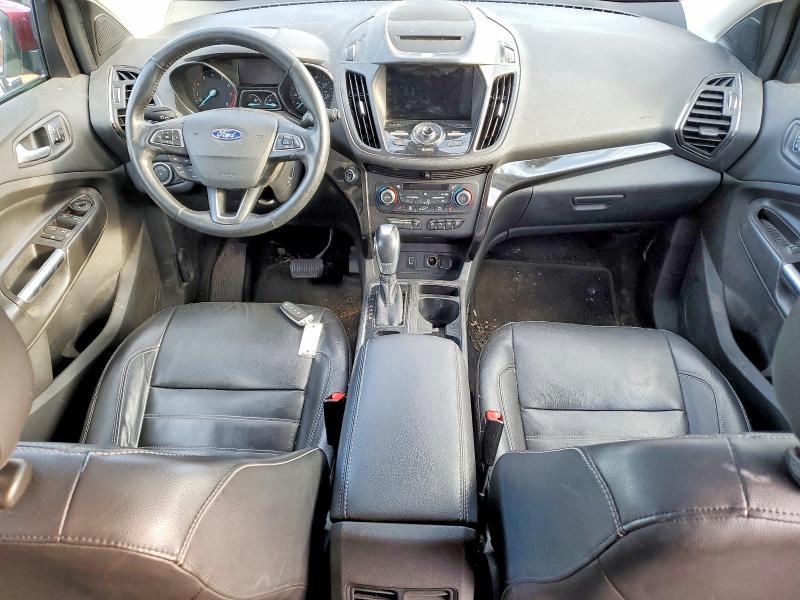 Photo 8 from auction – 2018 FORD ESCAPE with VIN 1FMCU9J95JUC83973