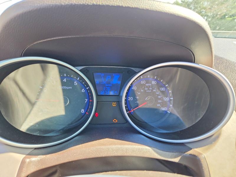 Photo 9 from auction – 2014 HYUNDAI TUCSON with VIN KM8JTCAF8EU950277