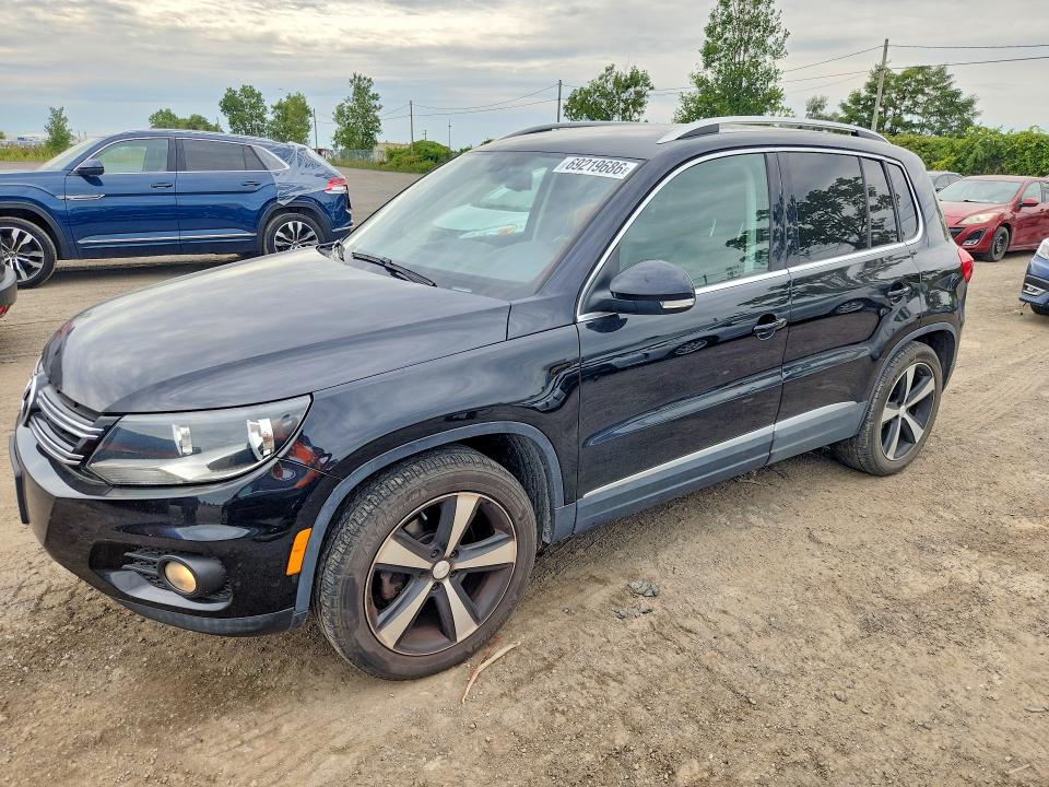 VOLKSWAGEN TIGUAN 2015 с VIN WVGJV7AX9FW522959 - Снимка от търг