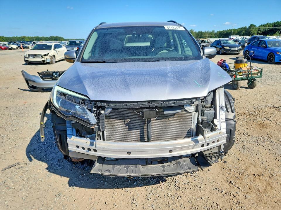 Photo 5 from auction – 2021 HONDA PILOT with VIN 5FNYF6H20MB011291