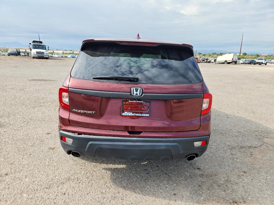 Photo 6 from auction – 2021 HONDA PASSPORT with VIN 5FNYF7H50MB003224