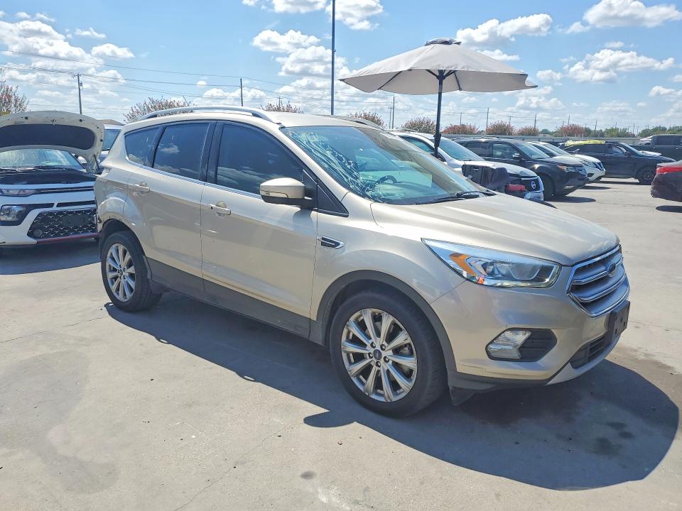 Photo 4 from auction – 2017 FORD ESCAPE with VIN 1FMCU0J95HUC95014