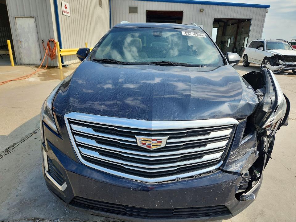 Photo 5 from auction – 2017 CADILLAC XT5 with VIN 1GYKNCRS0HZ243339