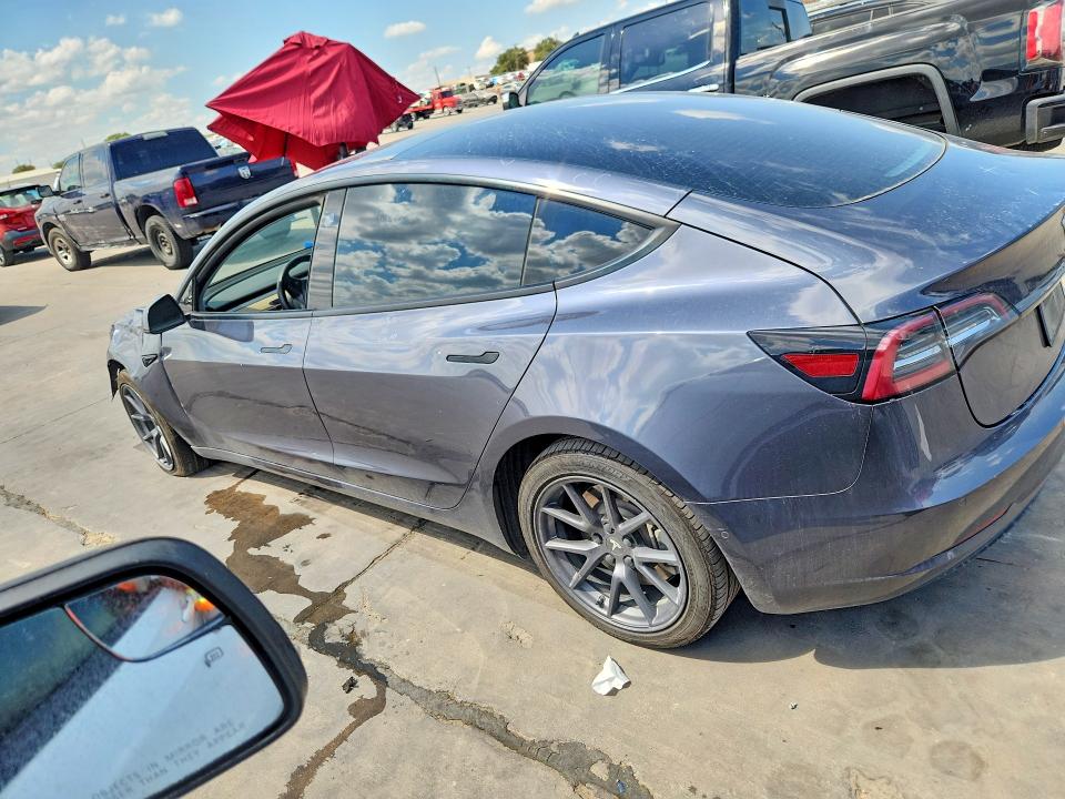 Photo 2 from auction – 2021 TESLA MODEL 3 with VIN 5YJ3E1EB4MF019771