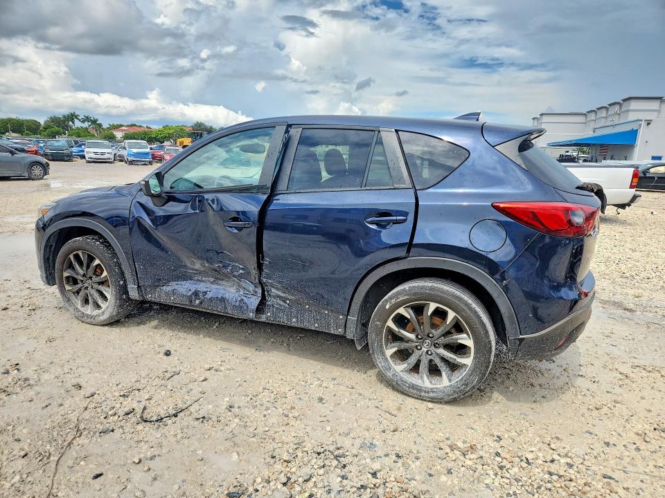 Снимка 2 от търг – 2016 MAZDA CX-5 с VIN JM3KE4DY2G0629956