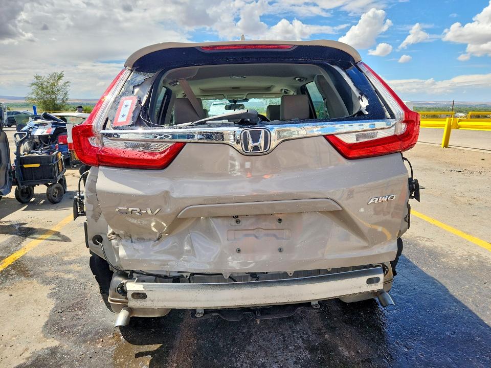 Photo 6 from auction – 2017 HONDA CR-V with VIN 5J6RW2H59HL073213