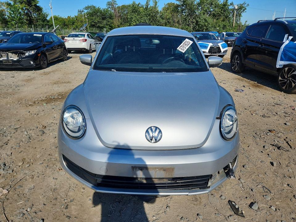 Photo 5 from auction – 2012 VOLKSWAGEN BEETLE with VIN 3VWJP7AT3CM605792