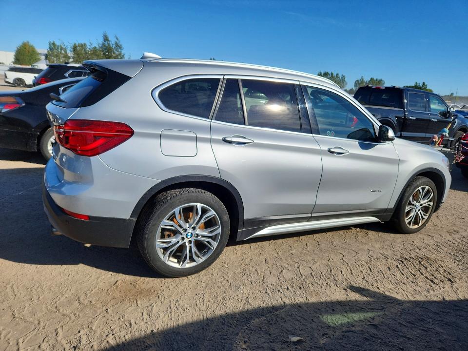 Снимка 3 от търг – 2016 BMW X1 с VIN WBXHT3C31GP881393