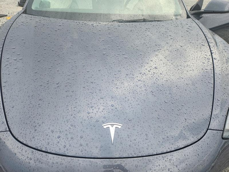 Снимка 11 от търг – 2023 TESLA MODEL 3 с VIN 5YJ3E1EA0PF714373