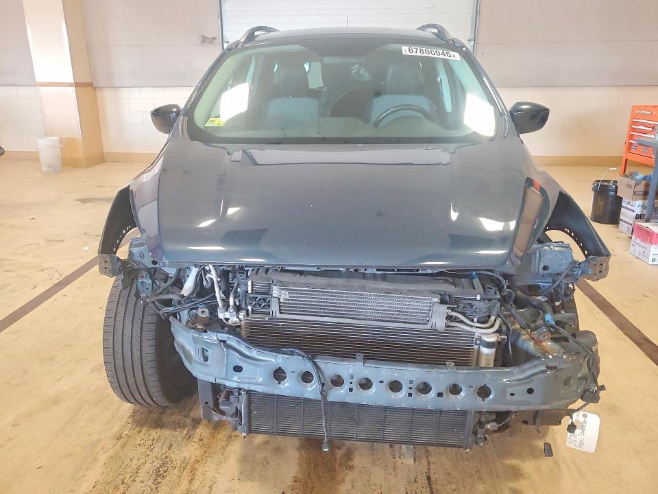 Photo 5 from auction – 2019 FORD ESCAPE with VIN 1FMCU9GD1KUC42690