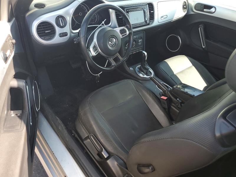 Photo 8 from auction – 2013 VOLKSWAGEN BEETLE with VIN 3VWJP7AT7DM676673