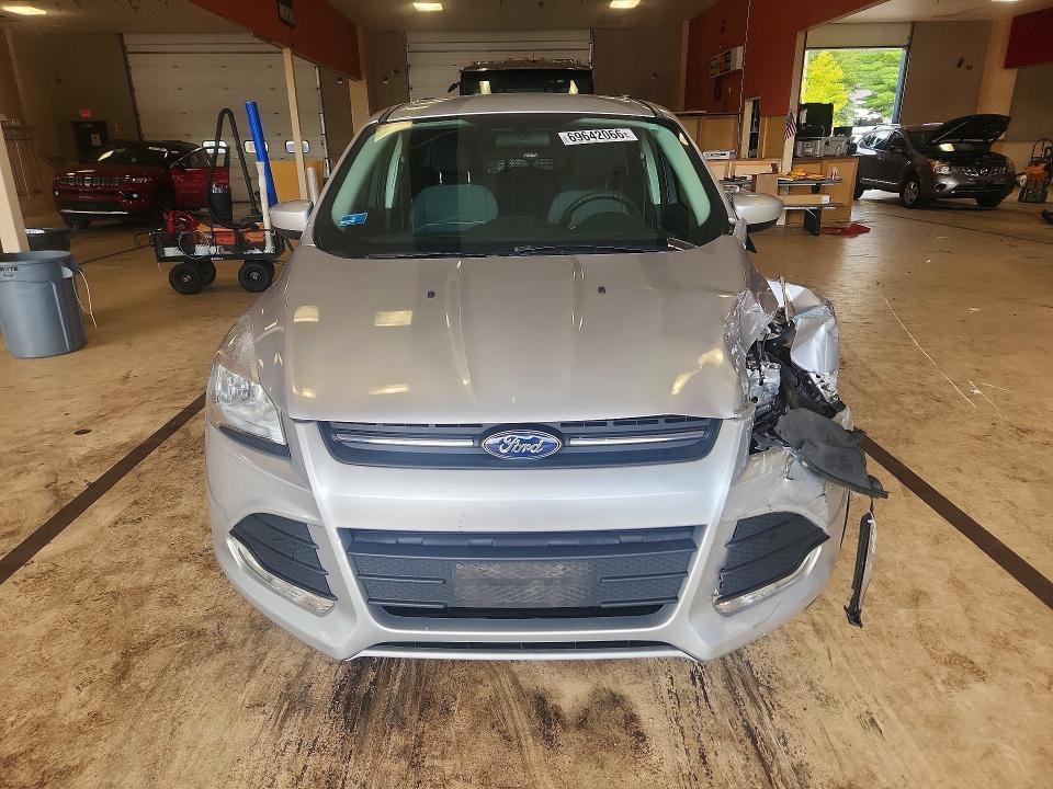 Снимка 5 от търг – 2015 FORD ESCAPE с VIN 1FMCU9GX9FUC58443