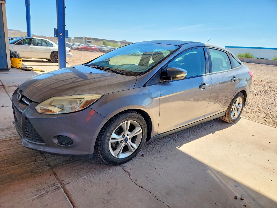 FORD FOCUS 2014 with VIN 1FADP3F2XEL129592 - Photo from auction