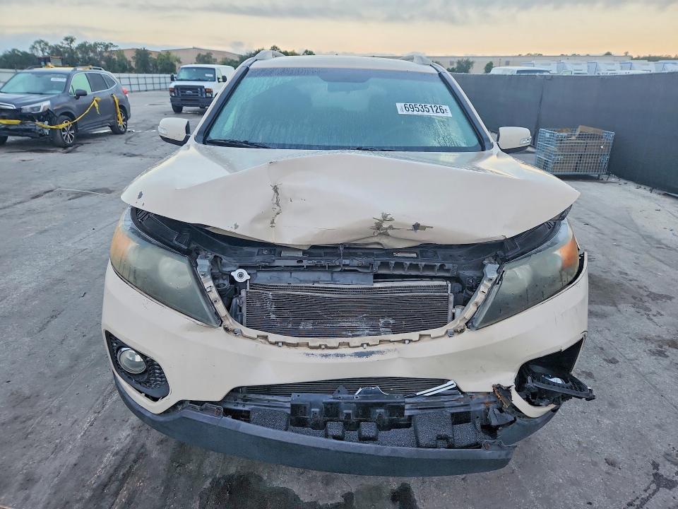 Photo 5 from auction – 2011 KIA SORENTO with VIN 5XYKU3A1XBG072004