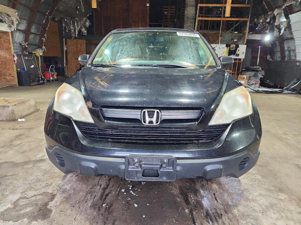 Photo 5 from auction – 2009 HONDA CR-V with VIN 5J6RE48349L017338