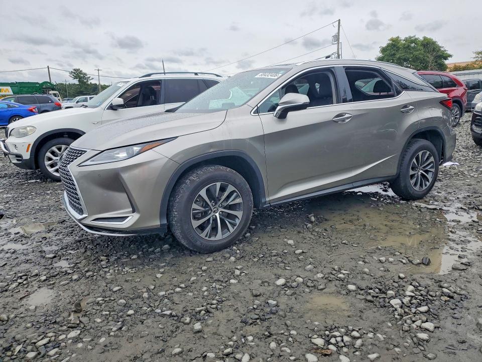 LEXUS RX 2021 with VIN 2T2HZMDA6MC265497 - Photo from auction