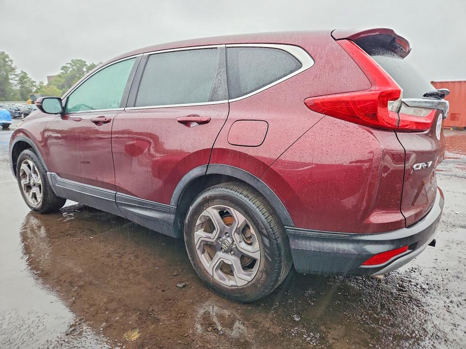 Photo 2 from auction – 2018 HONDA CR-V with VIN 7FARW2H89JE090333