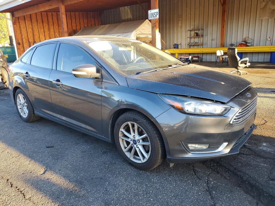 Photo 4 from auction – 2016 FORD FOCUS with VIN 1FADP3F28GL386933