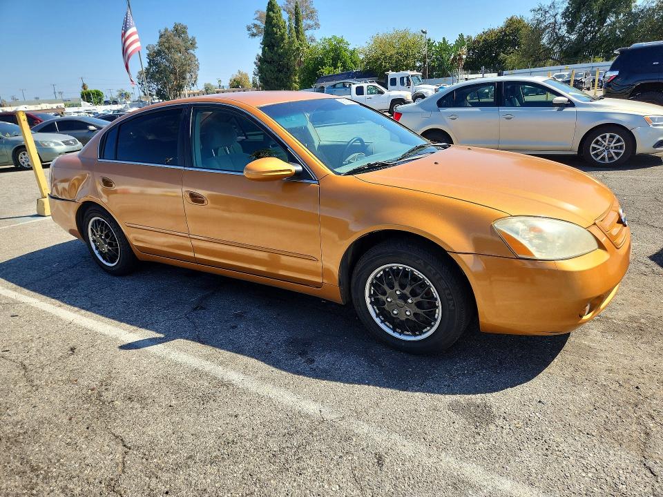 Photo 4 from auction – 2002 NISSAN ALTIMA with VIN 1N4AL11D12C113384