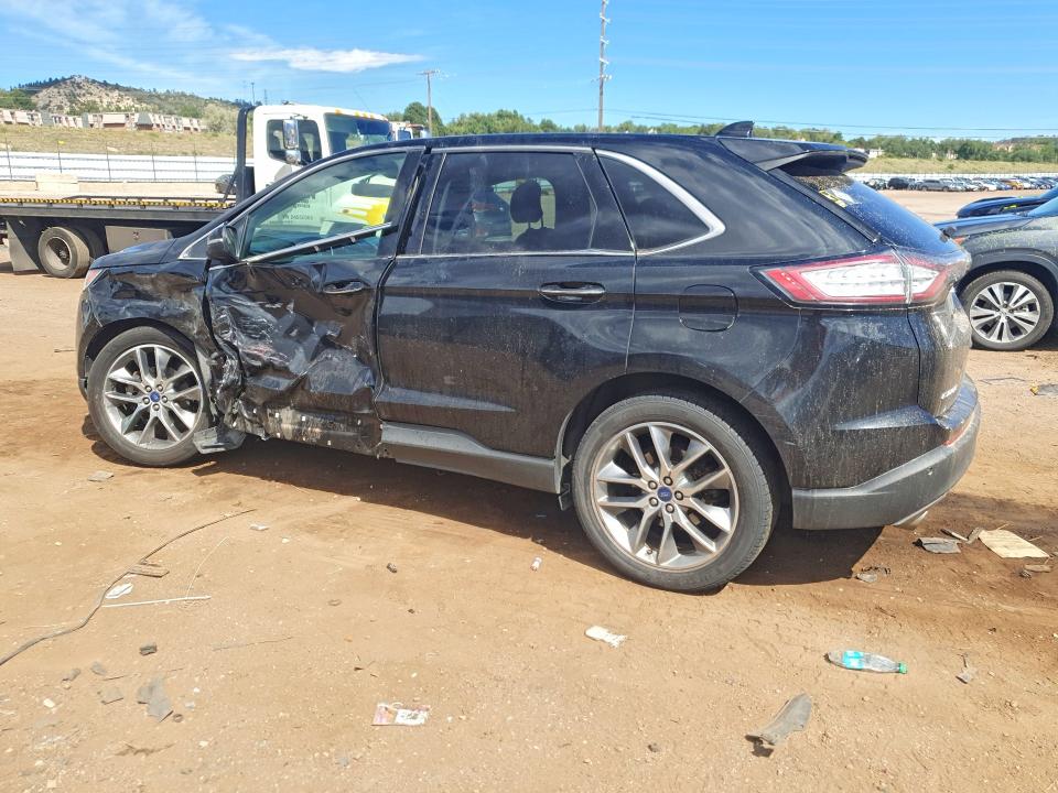 Снимка 2 от търг – 2015 FORD EDGE с VIN 2FMTK3K96FBB92399