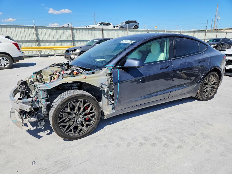 TESLA MODEL 3 2022 with VIN 5YJ3E1EC3NF209071 - Photo from auction