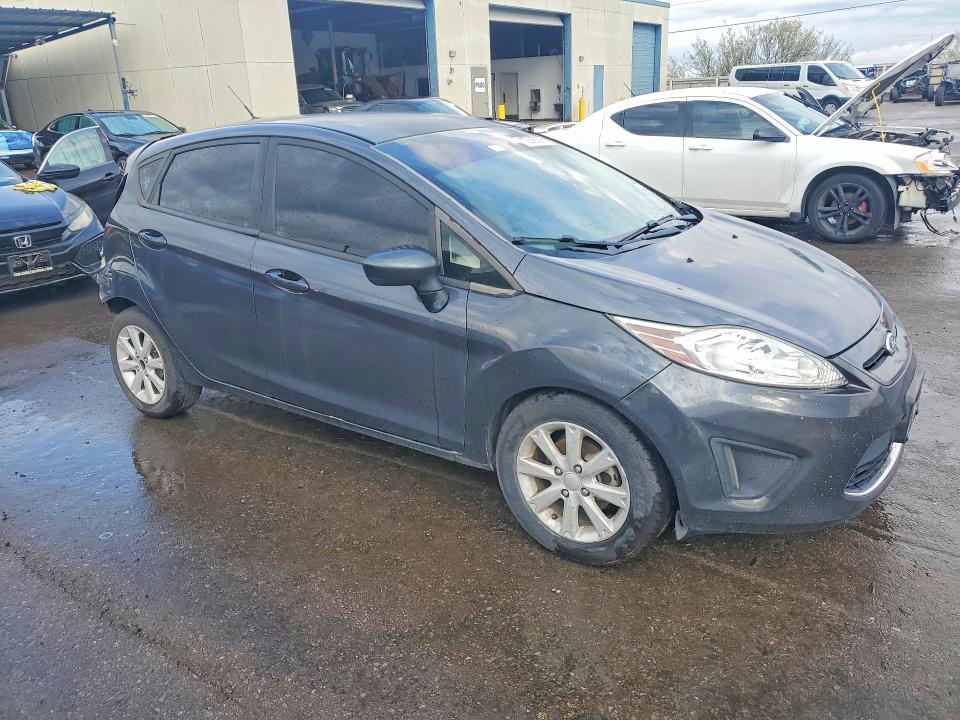Снимка 4 от търг – 2011 FORD FIESTA с VIN 3FADP4EJ8BM156721