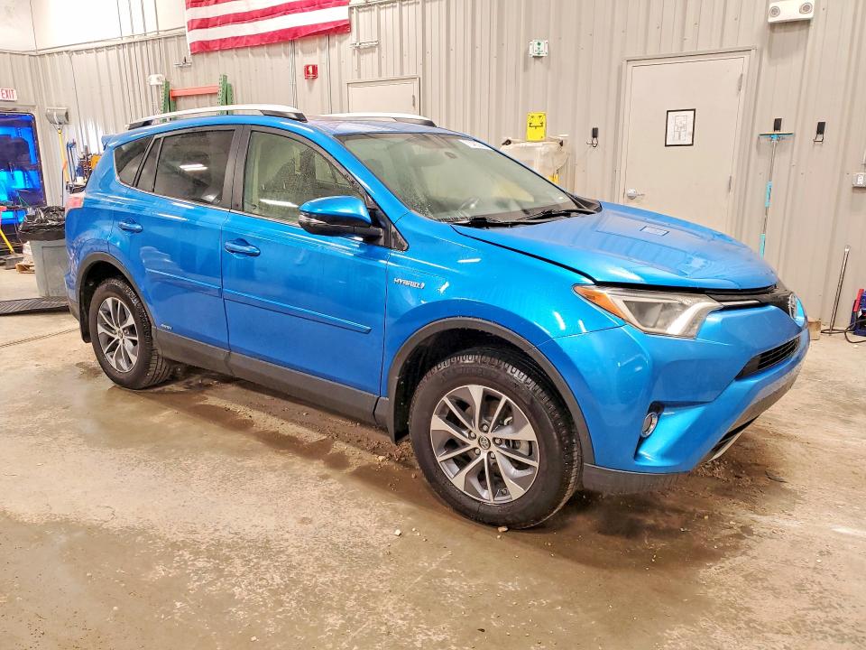 Photo 4 from auction – 2016 TOYOTA RAV4 HV with VIN JTMRJREV9GD023745