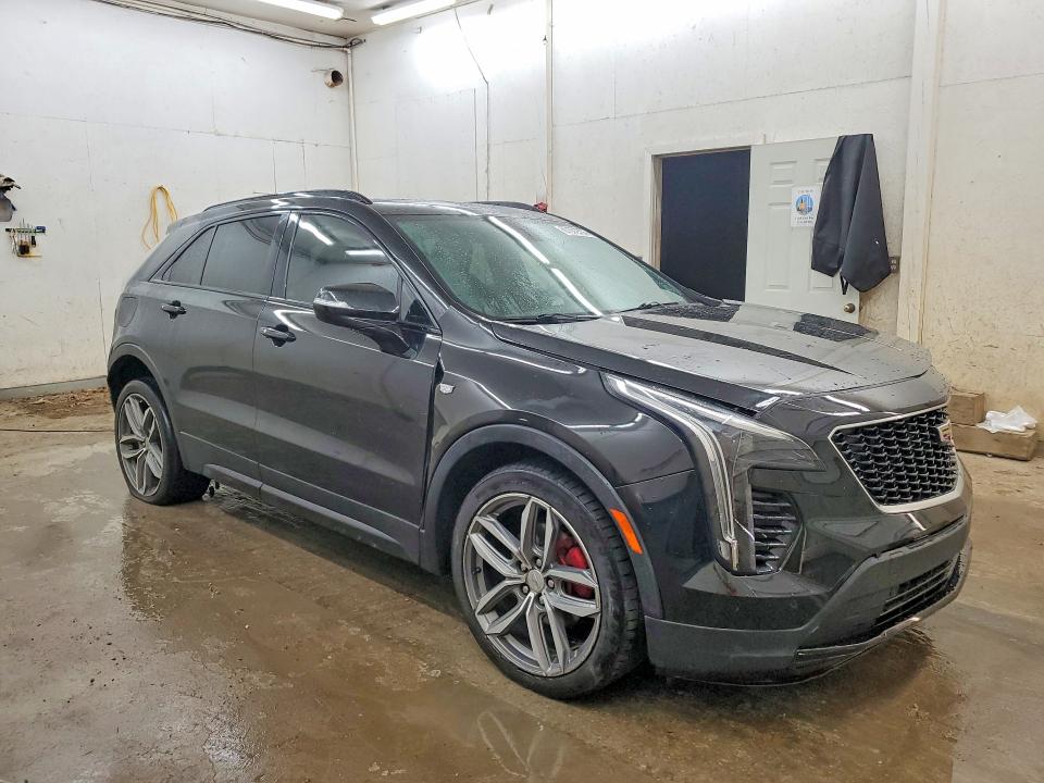 Photo 4 from auction – 2021 CADILLAC XT4 with VIN 1GYFZER41MF001755