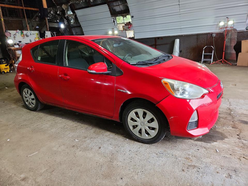 Photo 4 from auction – 2014 TOYOTA PRIUS C with VIN JTDKDTB31E1069304
