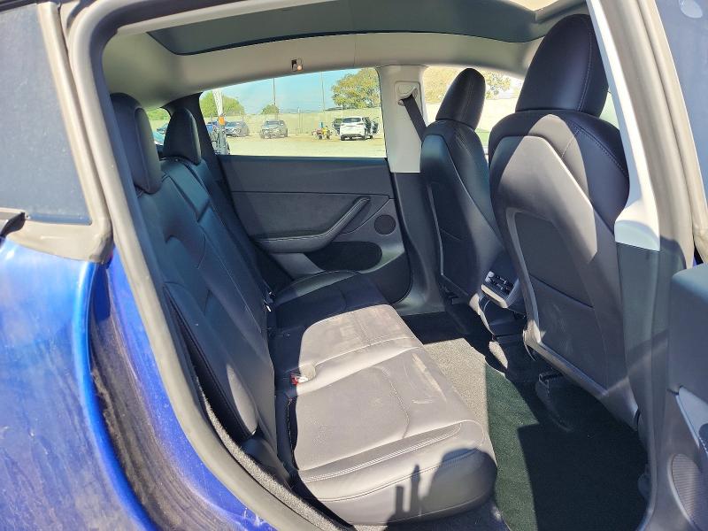 Photo 11 from auction – 2023 TESLA MODEL Y with VIN 7SAYGDED3PF947095
