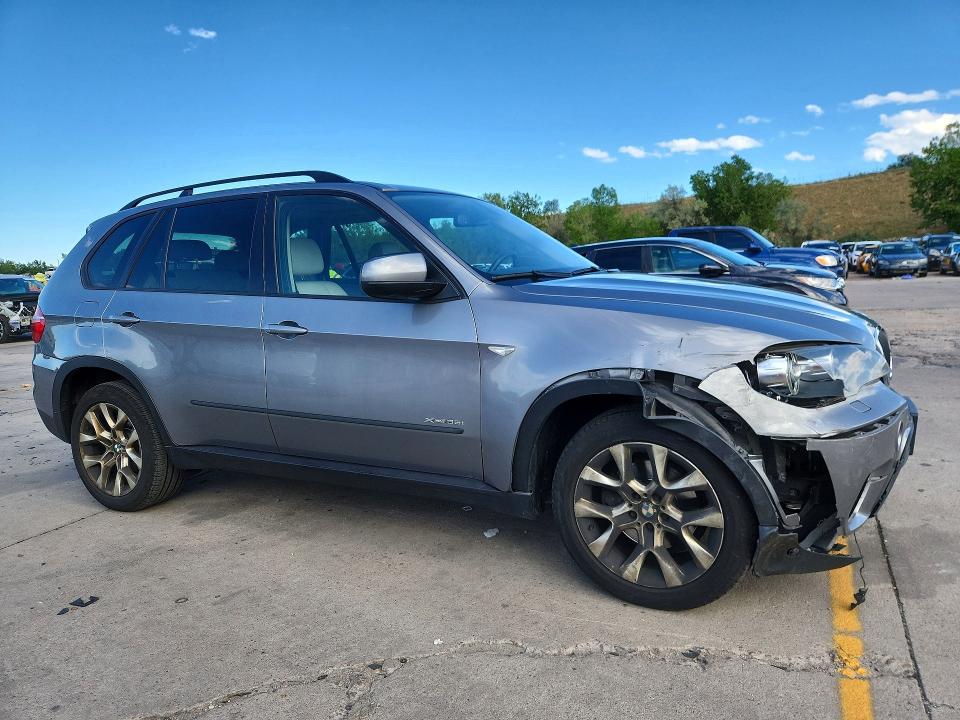 Photo 4 from auction – 2011 BMW X5 with VIN 5UXZV4C52BL743556