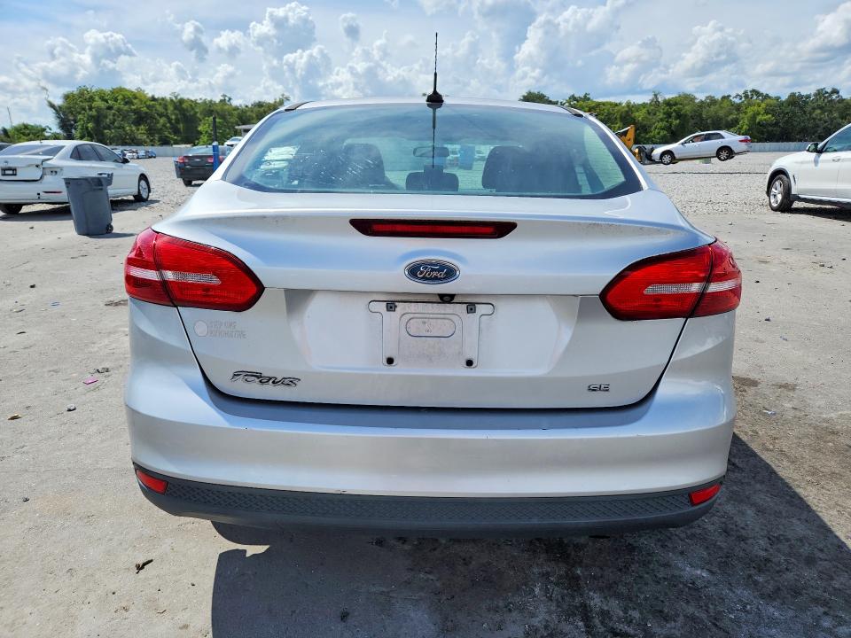 Foto 6 de la subasta – 2017 FORD FOCUS con VIN 1FADP3F21HL248247