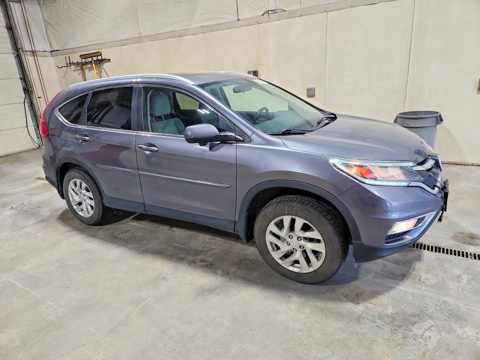 Photo 4 from auction – 2016 HONDA CR-V with VIN 2HKRM4H5XGH613419