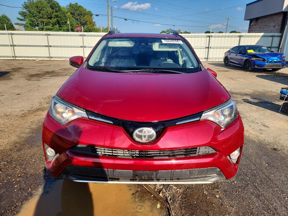 Photo 5 from auction – 2018 TOYOTA RAV4 with VIN 2T3WFREV5JW516837
