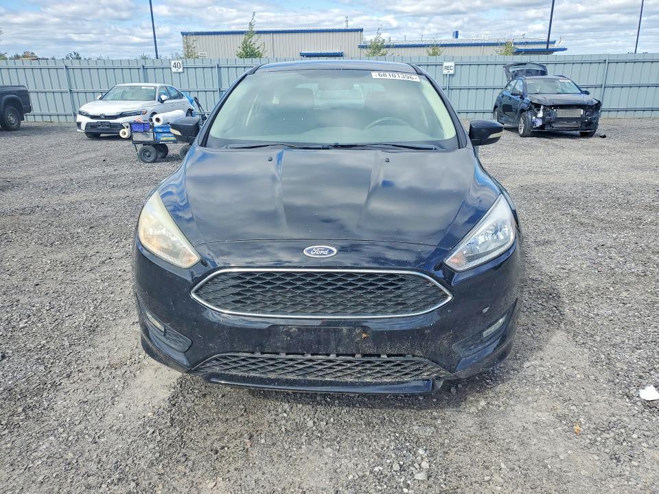 Photo 5 from auction – 2016 FORD FOCUS with VIN 1FADP3K25GL278100