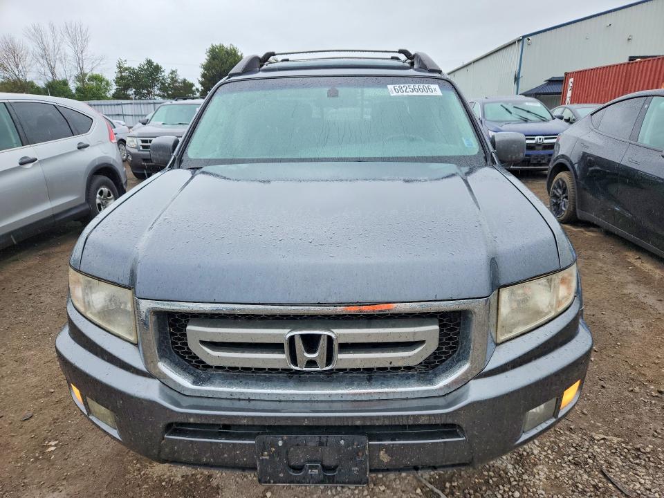 Photo 5 from auction – 2010 HONDA RIDGELINE with VIN 5FPYK1F58AB503498