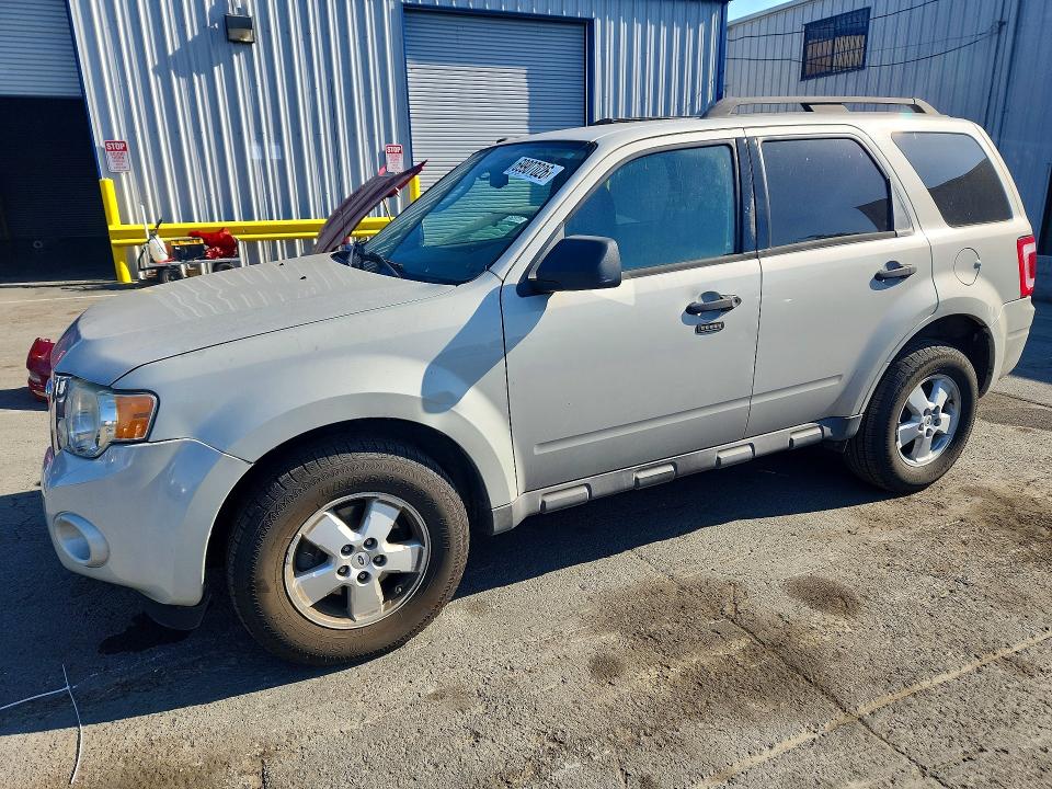 FORD ESCAPE 2009 with VIN 1FMCU03799KA26832 - Photo from auction