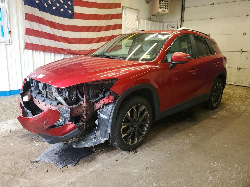 MAZDA CX-5 2016 with VIN JM3KE4DY7G0619679 - Photo from auction
