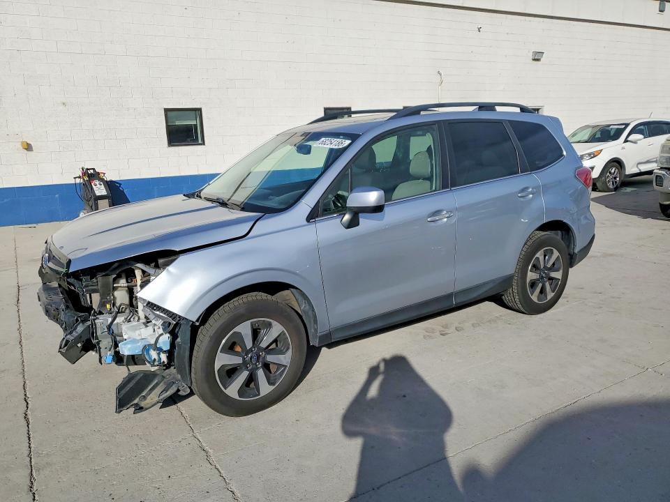SUBARU FORESTER 2018 with VIN JF2SJAJC6JH460384 - Photo from auction