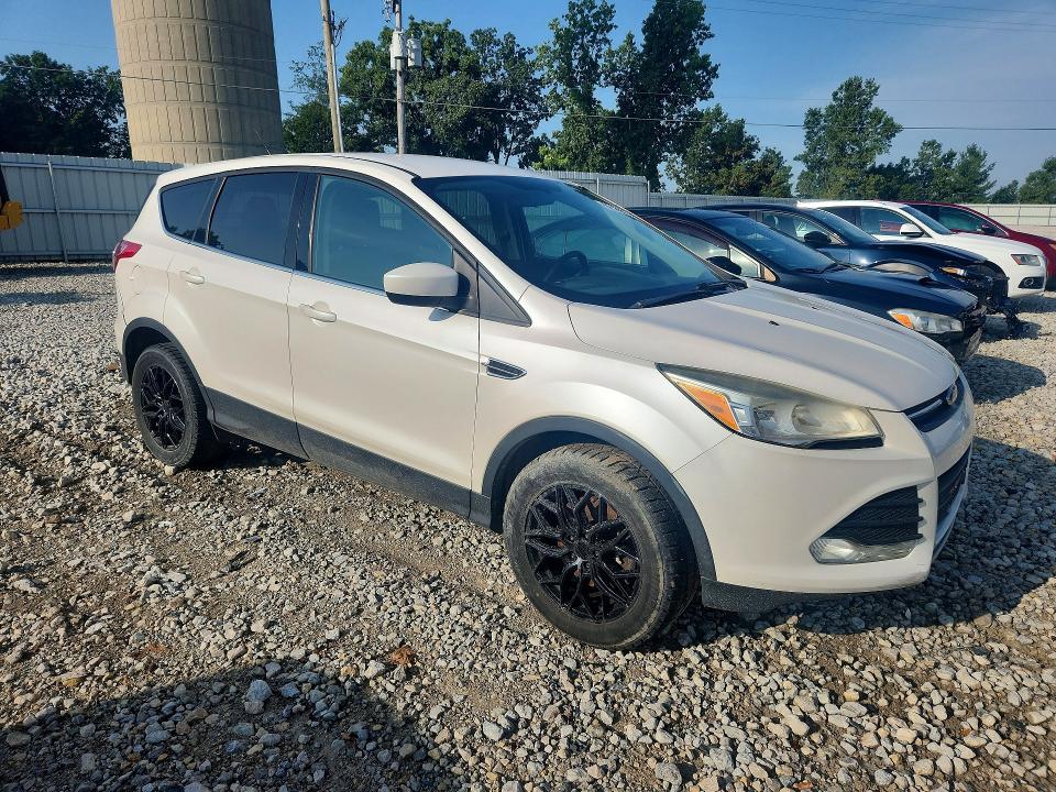 Foto 4 de la subasta – 2013 FORD ESCAPE con VIN 1FMCU9GX9DUD89594