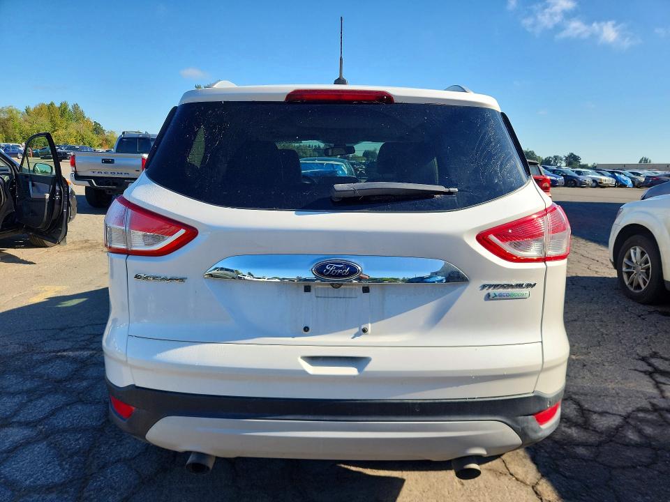 Foto 6 de la subasta – 2014 FORD ESCAPE con VIN 1FMCU0JX5EUC52531