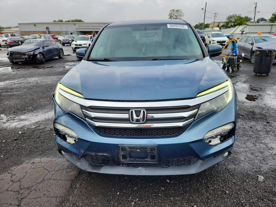 Photo 5 from auction – 2016 HONDA PILOT with VIN 5FNYF6H5XGB075966