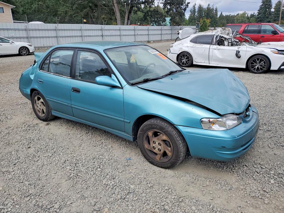 Photo 4 from auction – 1999 TOYOTA COROLLA with VIN 1NXBR12E7XZ239167