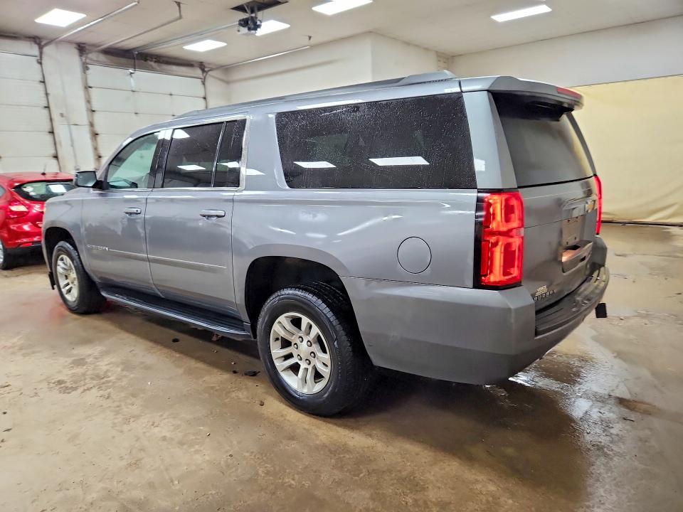 Photo 2 from auction – 2019 CHEVROLET SUBURBAN with VIN 1GNSCGKC8KR139928
