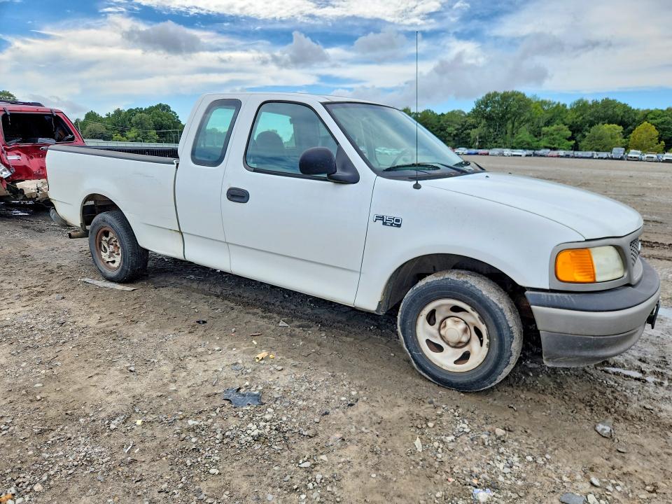 Снимка 4 от търг – 2004 FORD F-150 HERITAGE с VIN 2FTRX17264CA37925