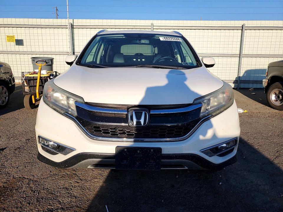 Photo 5 from auction – 2015 HONDA CR-V with VIN 5J6RM4H79FL005607