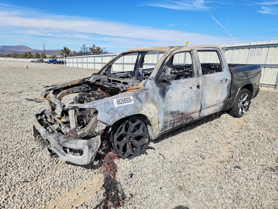 RAM 1500 2021 with VIN 1C6SRFHM9MN565677 - Photo from auction