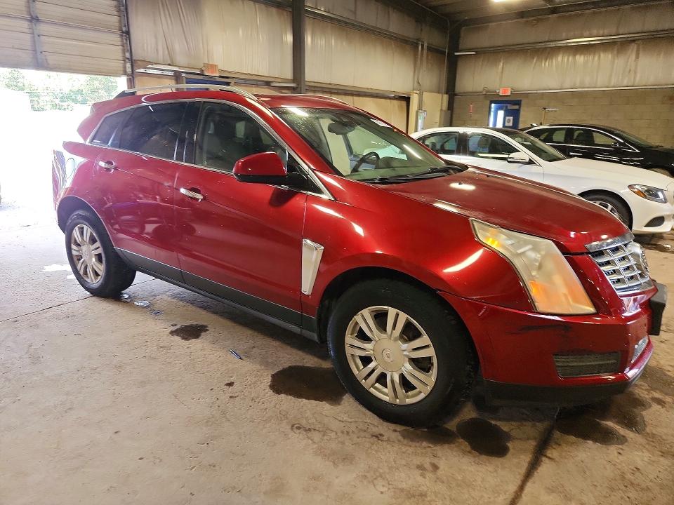 Photo 4 from auction – 2013 CADILLAC SRX with VIN 3GYFNGE32DS655325