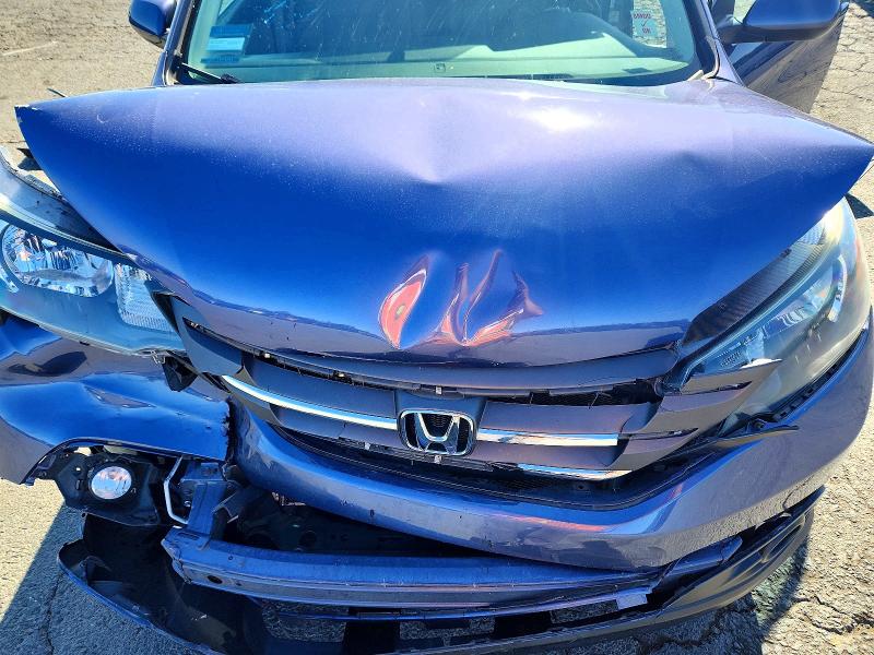 Photo 11 from auction – 2014 HONDA CR-V with VIN 2HKRM3H50EH506080